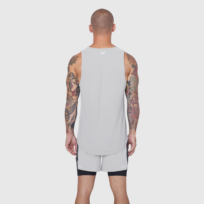 Laser-Vent™ Tank Top in slate grey, back view on model with tattoos