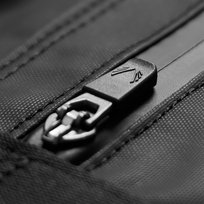 Flatlay of Barrel Gym Duffle Bag 30L in black, zipper detail closeup