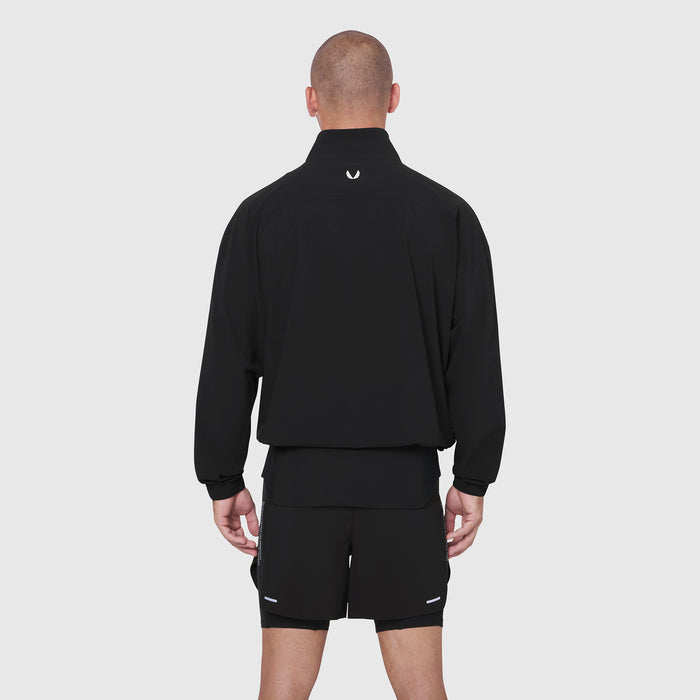 Aerotex Quarter-Zip Jacket in black, worn by model from back view