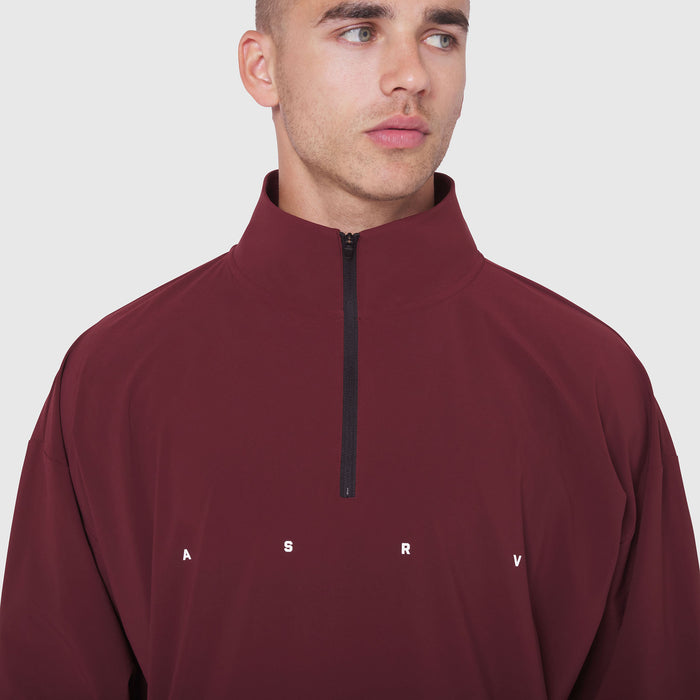 Aerotex Quarter-Zip Jacket in crimson, modeled on male wearing half-zip pullover