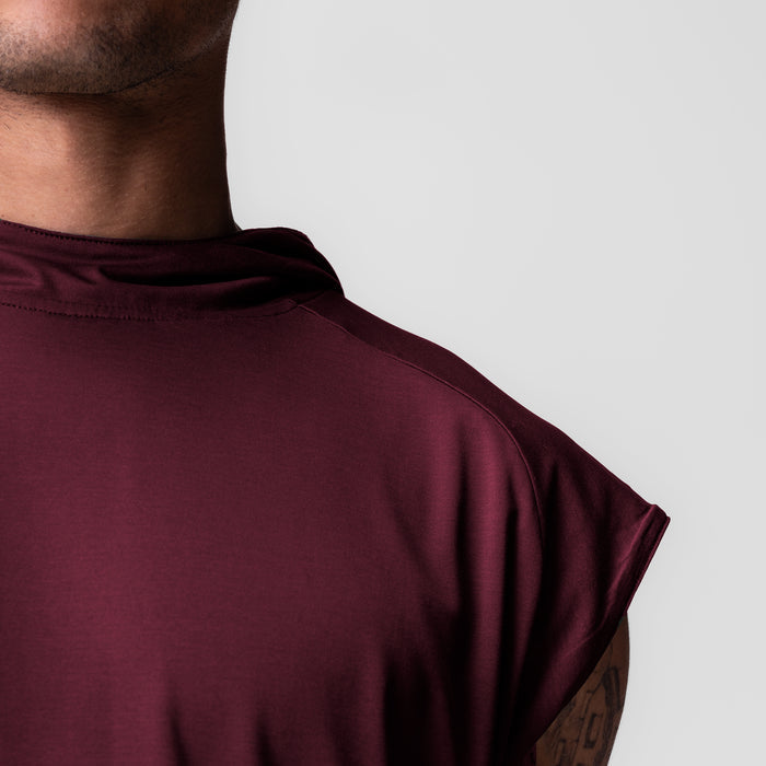 Reversible 2-in-1 Cutoff Hoodie in crimson, worn by model from shoulder back view