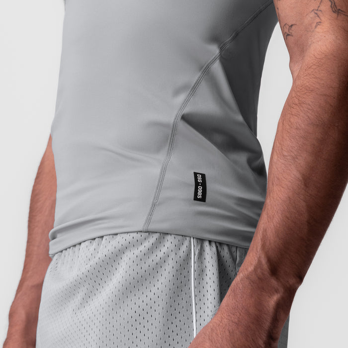 WarpFlexx-Lite Slim Tank in Slate Grey, worn by model, side view