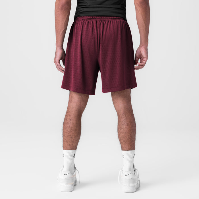 Reversible 2-in-1 Short in Crimson, back view on model with white socks