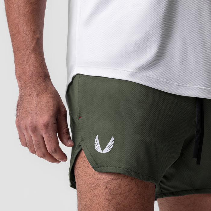 AeroSilver 5" linerless short in olive, worn by model, side view