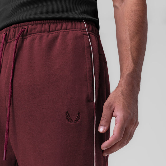 Herringbone Terry Snap Button Sweats in Crimson worn by model, side view detail
