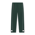 flatlay Herringbone Terry Snap Button Sweats in forest green with white cuff details, front view