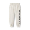 flatlay Womens Sherpa Recovery Sweats in ivory cream with black text design, front view