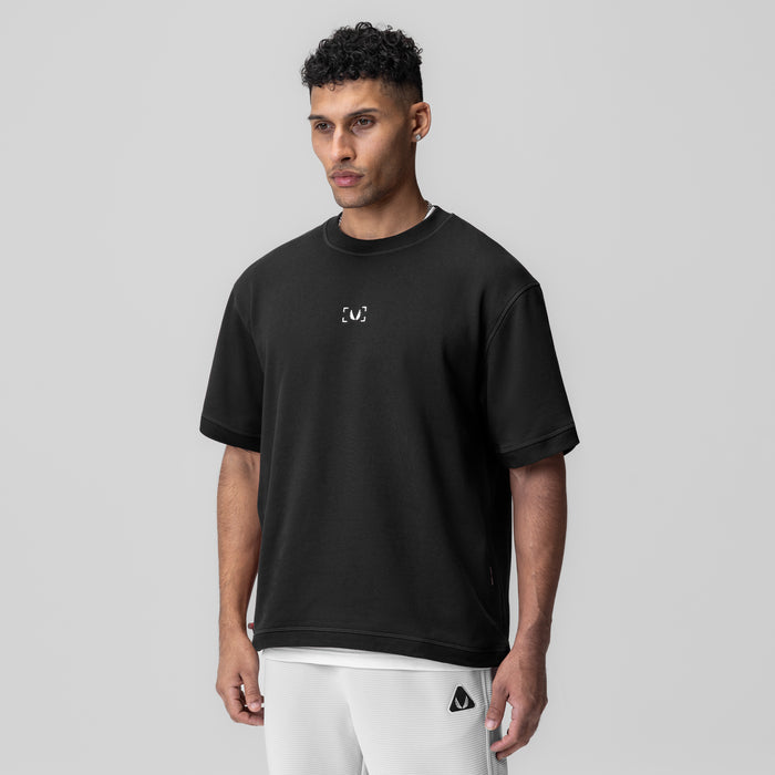 Herringbone Terry Oversized Cinch Tee in black, modeled front view
