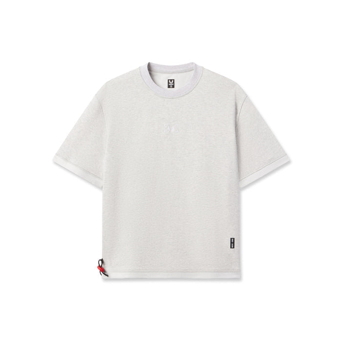 Flatlay of Herringbone Terry Oversized Cinch Tee in heather grey, front view