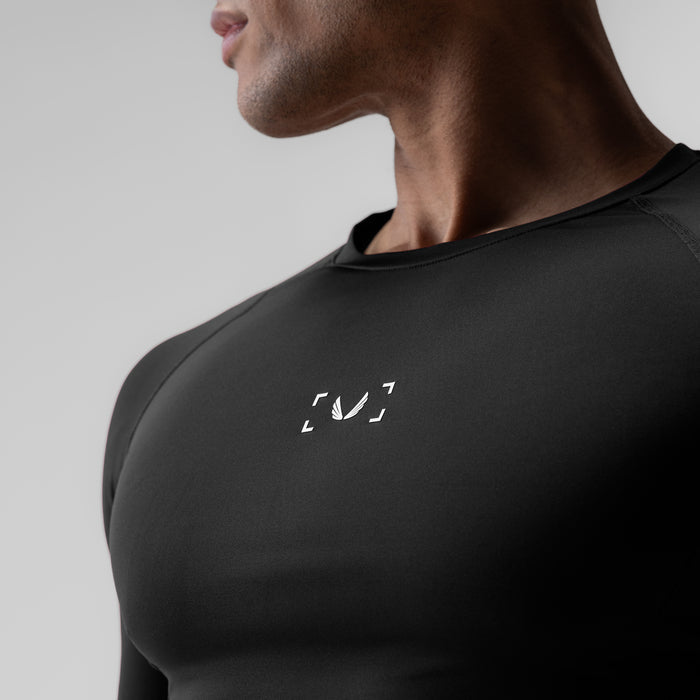 WarpFlexx-Lite® Half-Sleeve Baselayer in black, worn by model in side profile