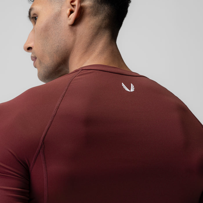 WarpFlexx-Lite Half-Sleeve Baselayer in crimson, worn by model from back