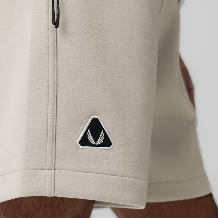 Dri-Core™ Training Short in Chai worn by model, side detail showing ASRV logo