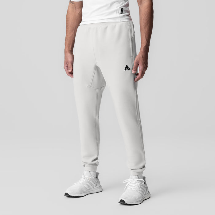 Dri-Core Training Jogger in light grey worn by model, front-facing view