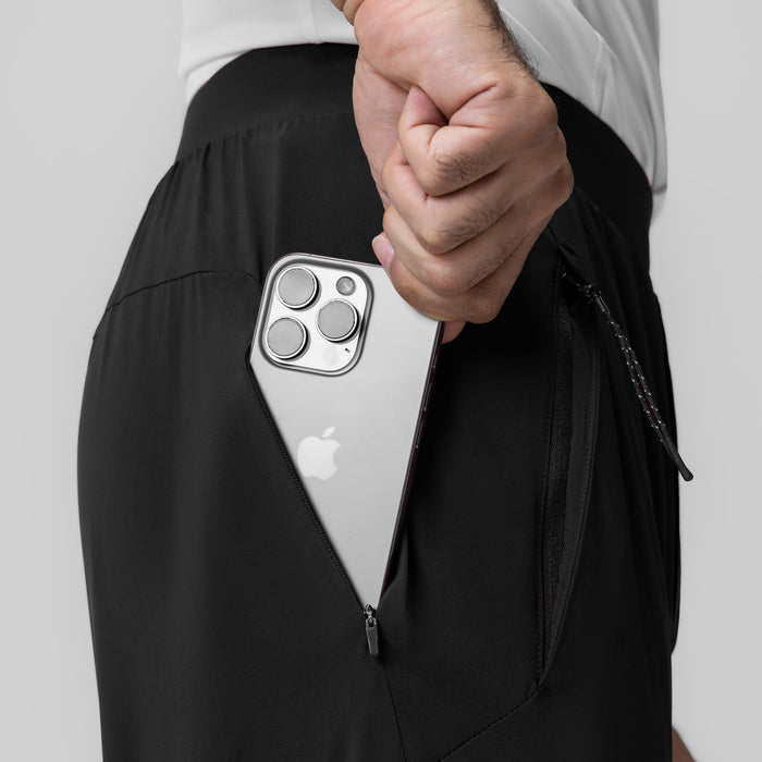Black Aerotex Weather-Ready Bonded Pant worn by model holding white iPhone in jacket pocket