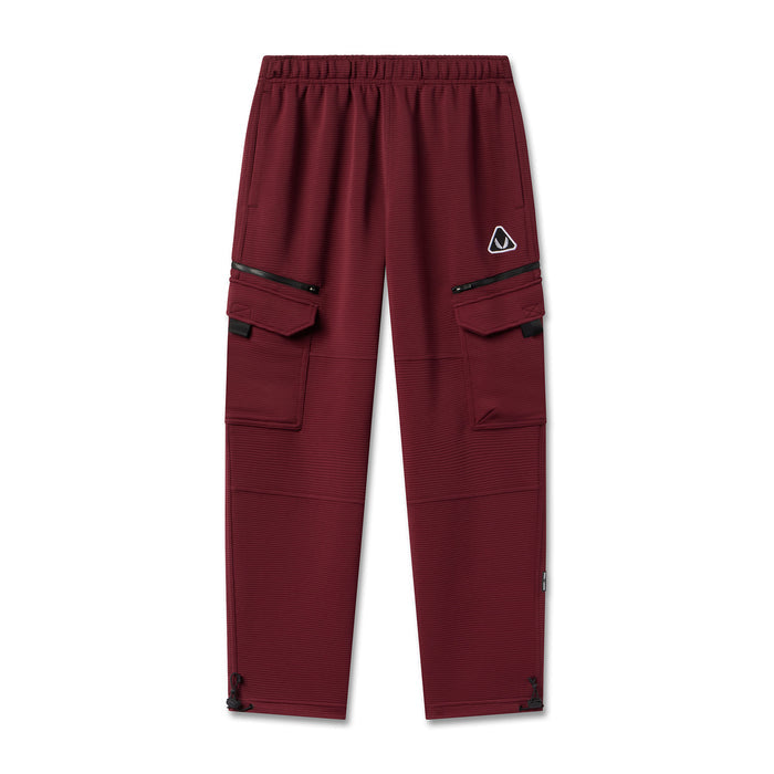 Flatlay of Deltapeak® Cargo Cinch Jogger in crimson with cargo pockets and ribbed texture