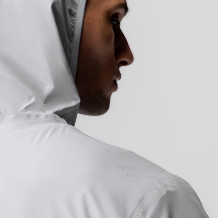 Aerotex™ Lightweight Windbreaker in slate grey, worn by model in profile view