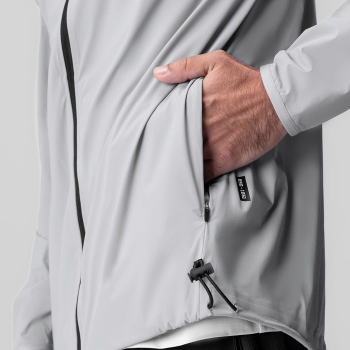 Aerotex Lightweight Windbreaker in slate grey, worn by model showing zipper detail