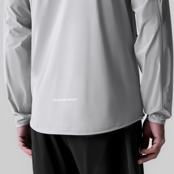 Aerotex™ Lightweight Windbreaker in slate grey worn by model, back view