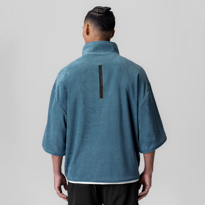 Towel Terry Quarter Zip Oversized Tee in storm blue, back view on model