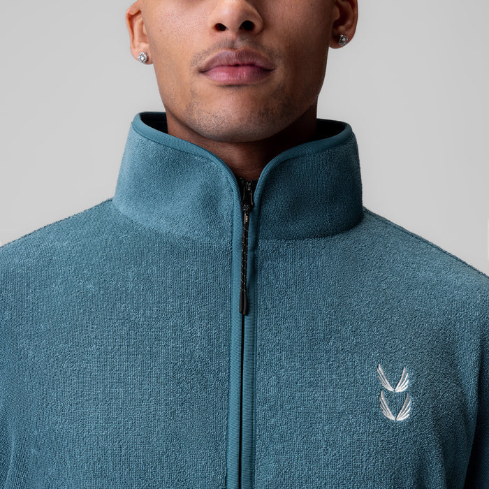 Towel Terry Quarter Zip Oversized Tee in storm blue, worn by model, front view