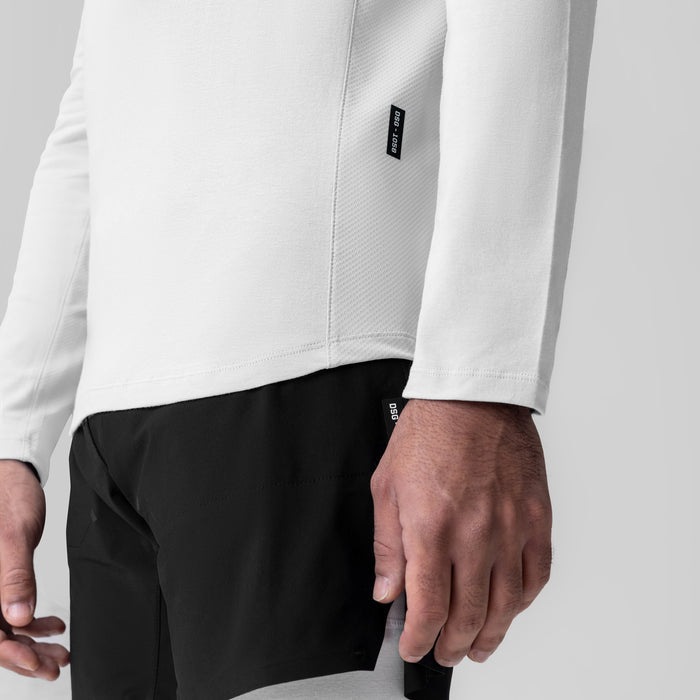 White Creora® Cotton Modal Long Sleeve worn with black shorts, side view detail