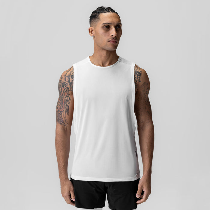 Ice-Skin™ Muscle Tank in white worn by model, front view