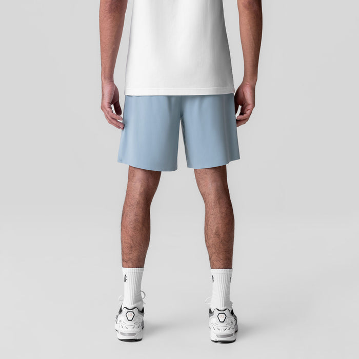 Revolutional Field Short in light sky blue, back view on model wearing white tee and white sneakers