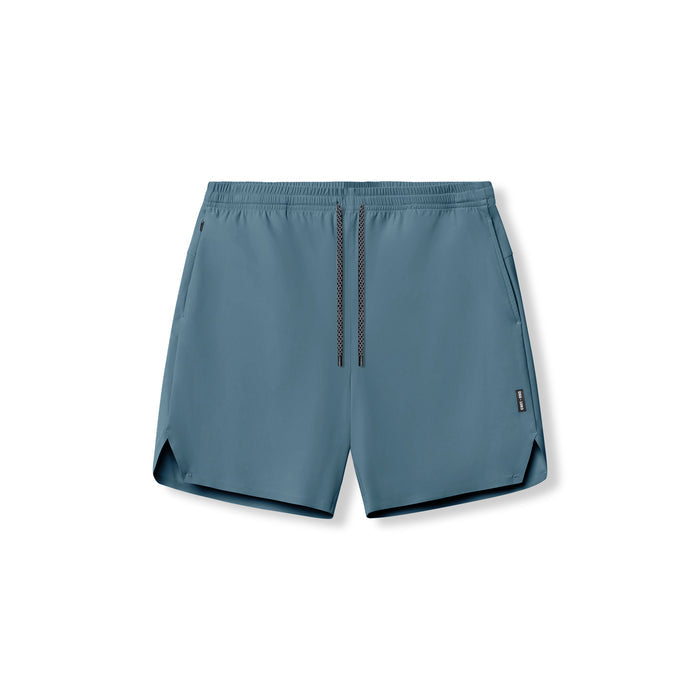 flatlay Revolutional Field Short in storm blue with black trim, front view