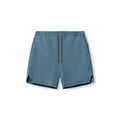 flatlay Revolutional Field Short in storm blue with black trim, front view