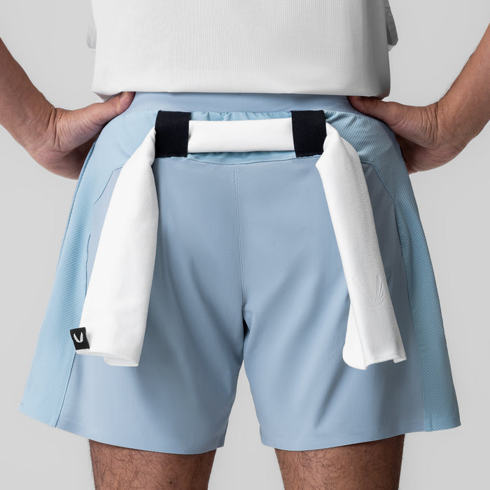Tetra-Lite Bonded Training Short in light sky, worn by model with towel detail