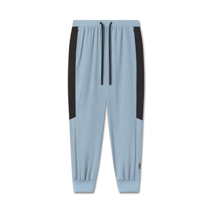flatlay Tetra-Lite Cuffed Training Jogger in light sky blue with black side panels, front view