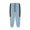 flatlay Tetra-Lite Cuffed Training Jogger in light sky blue with black side panels, front view