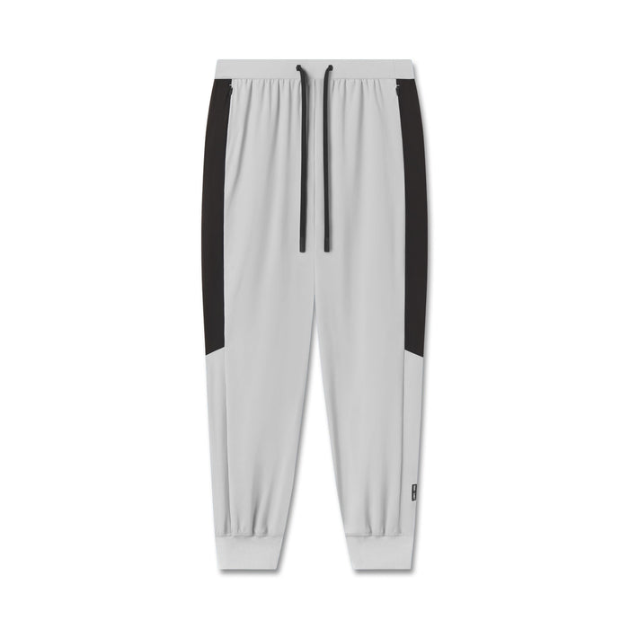 Flatlay of Tetra-Lite Cuffed Training Jogger in slate grey with black side panels, front view
