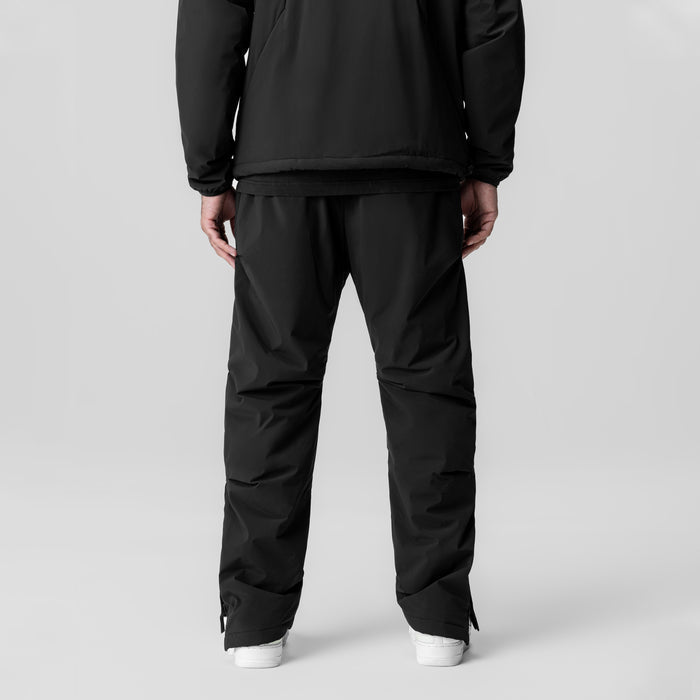 Aerotex™ PrimaLoft® Warm-Up Pant in black, rear view on model