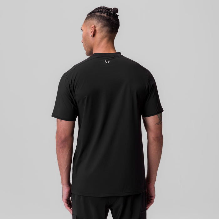 Black Tetra-Lite Ice Zip Tee worn by model, back view