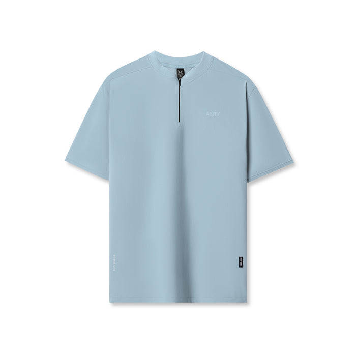 Flatlay of ASRV Tetra-Lite® Ice Zip Tee in light sky blue, front view