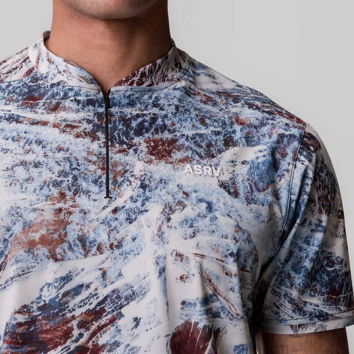 Tetra-Lite Ice Zip Tee in blue, red, and white Realtree Aspect camo, worn by model