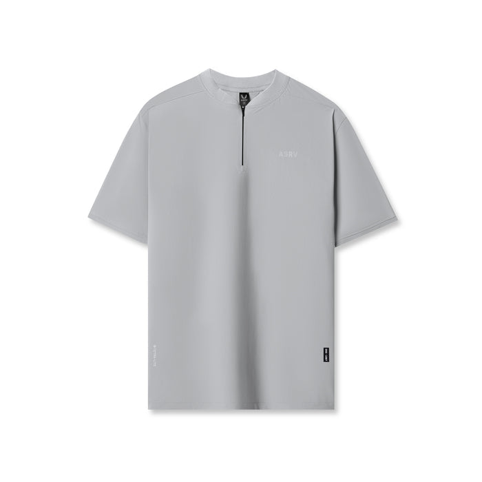 flatlay Tetra-Lite Ice Zip Tee in Slate Grey, front view