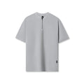 flatlay Tetra-Lite Ice Zip Tee in Slate Grey, front view