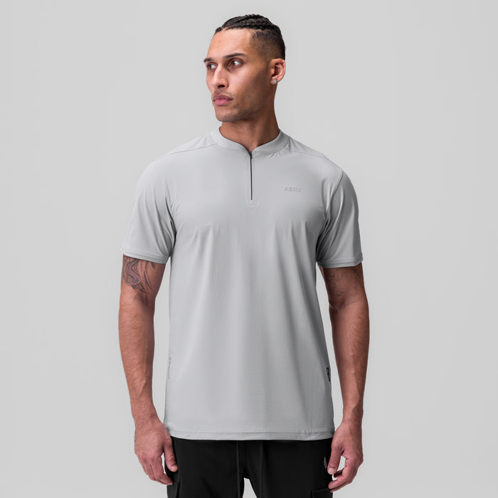 Tetra-Lite® Ice Zip Tee in slate grey worn by male model, front view