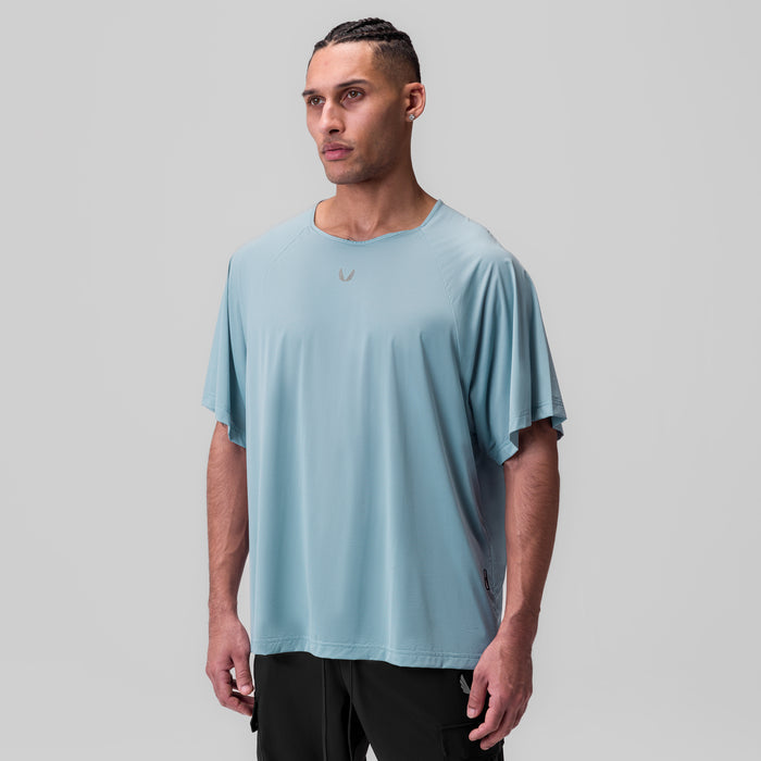 Ice-Skin™ Oversized Tee in light sky blue worn by model, front view