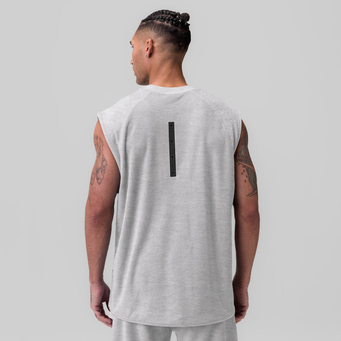 Heather grey towel terry cutoff tank top on male model, back view