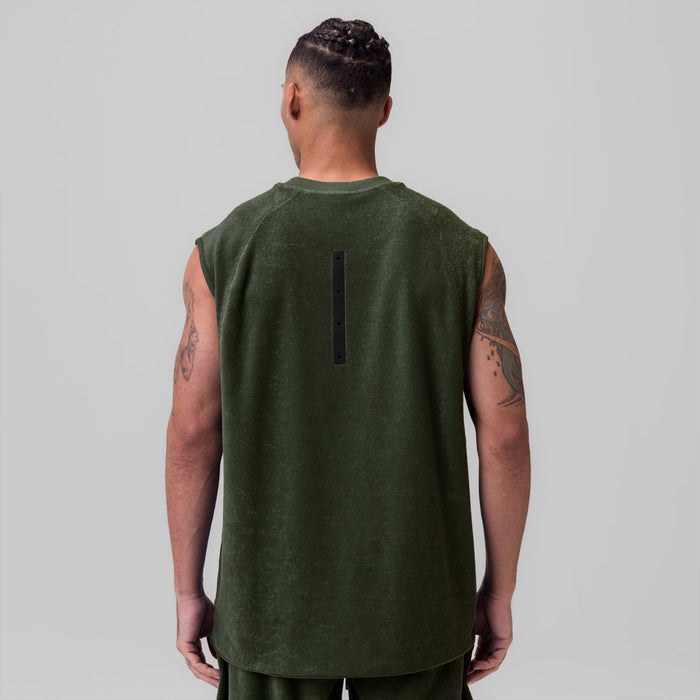 Towel Terry Cutoff tank in olive, back view on model