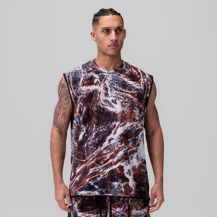 Towel Terry Cutoff sleeveless tank in burgundy/white marble print, front view on model