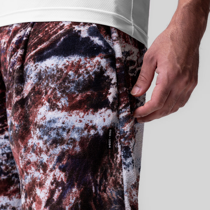 Towel Terry Relaxed Short in burgundy camo, worn on model showing side pocket detail