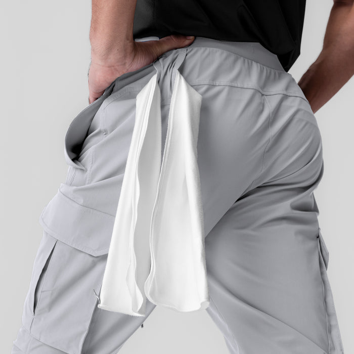 Tetra-Lite Ice Cargo jogger in slate grey worn by model, side view showing cargo pocket detail