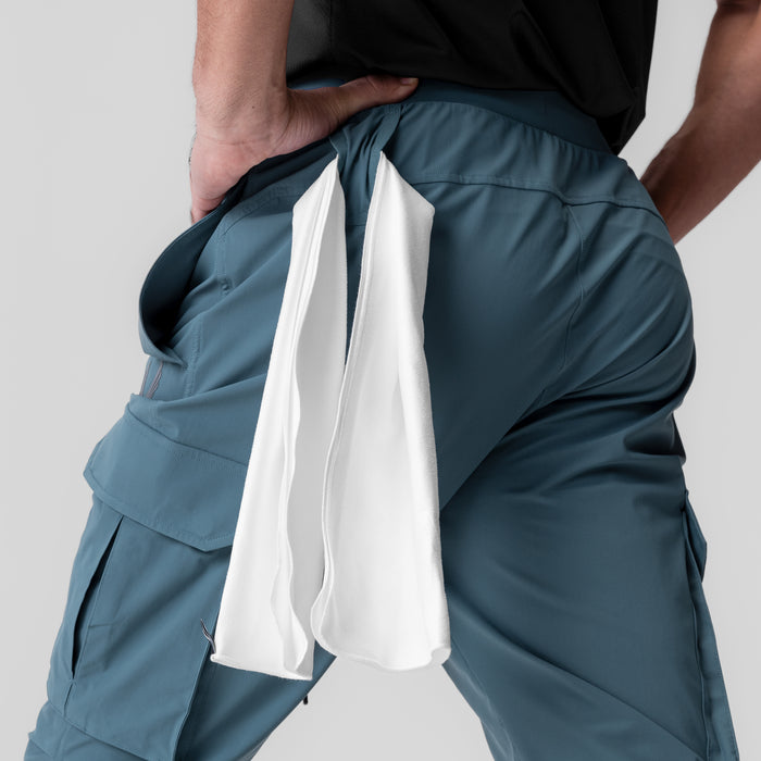 Tetra-Lite Ice Cargo jogger in storm blue, worn by model showing back pocket detail