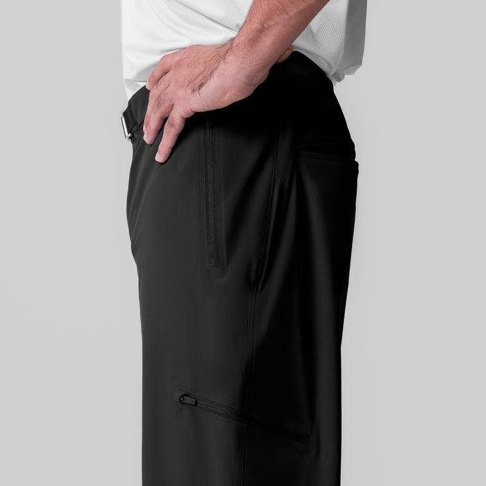 Tetra-Lite® Field Pant in black, worn by model showing side pocket and zipper details