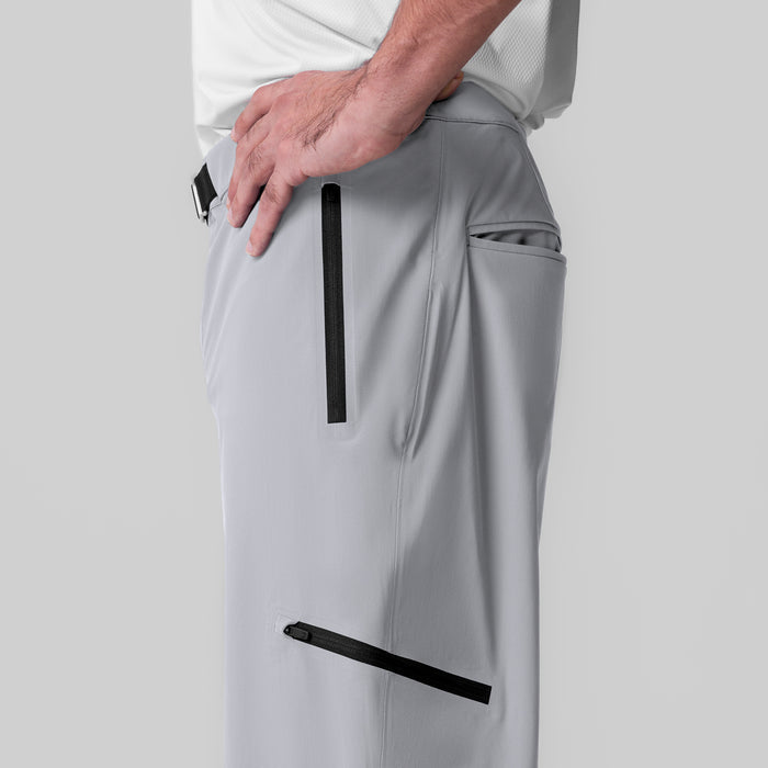 Tetra-Lite® Field Pant in Slate Grey worn by model, side view showing zip pockets