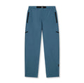 Flatlay of Tetra-Lite Field Pant in storm blue with zip pockets and belt detail
